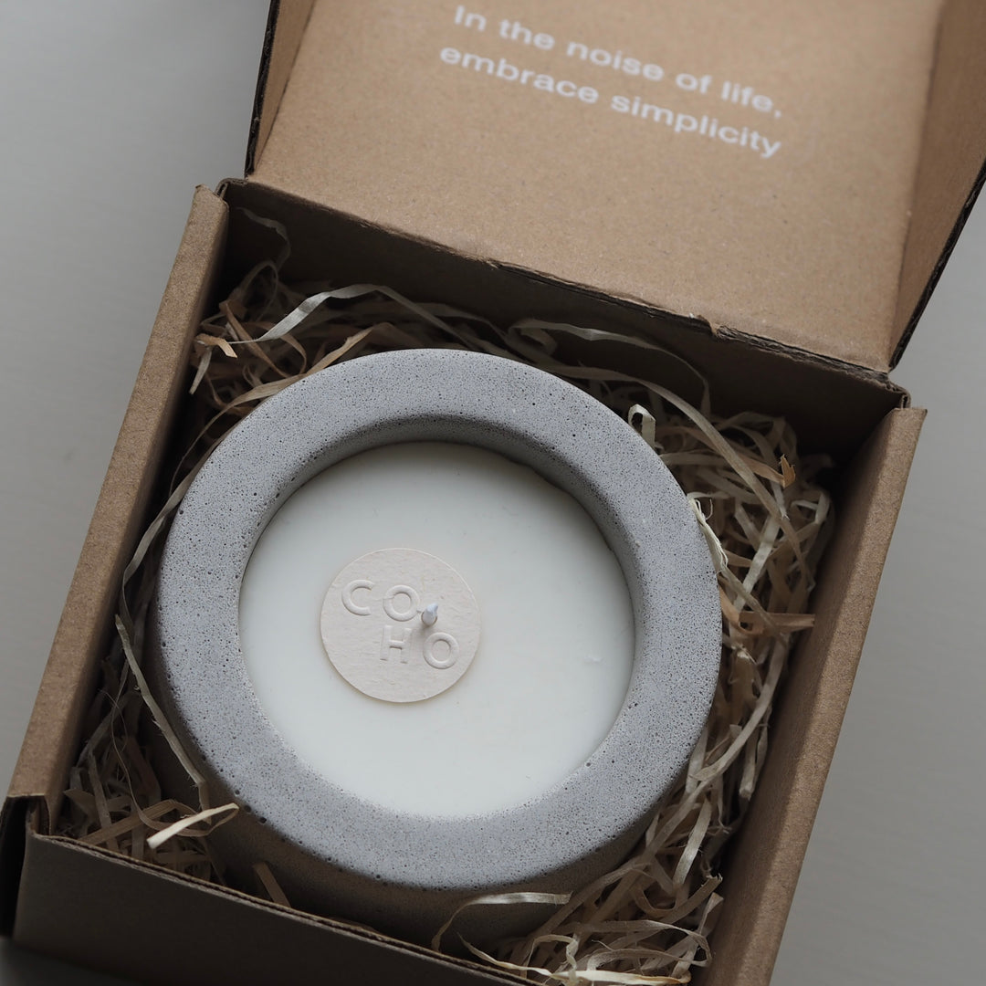 Modern grey packaged concrete candle